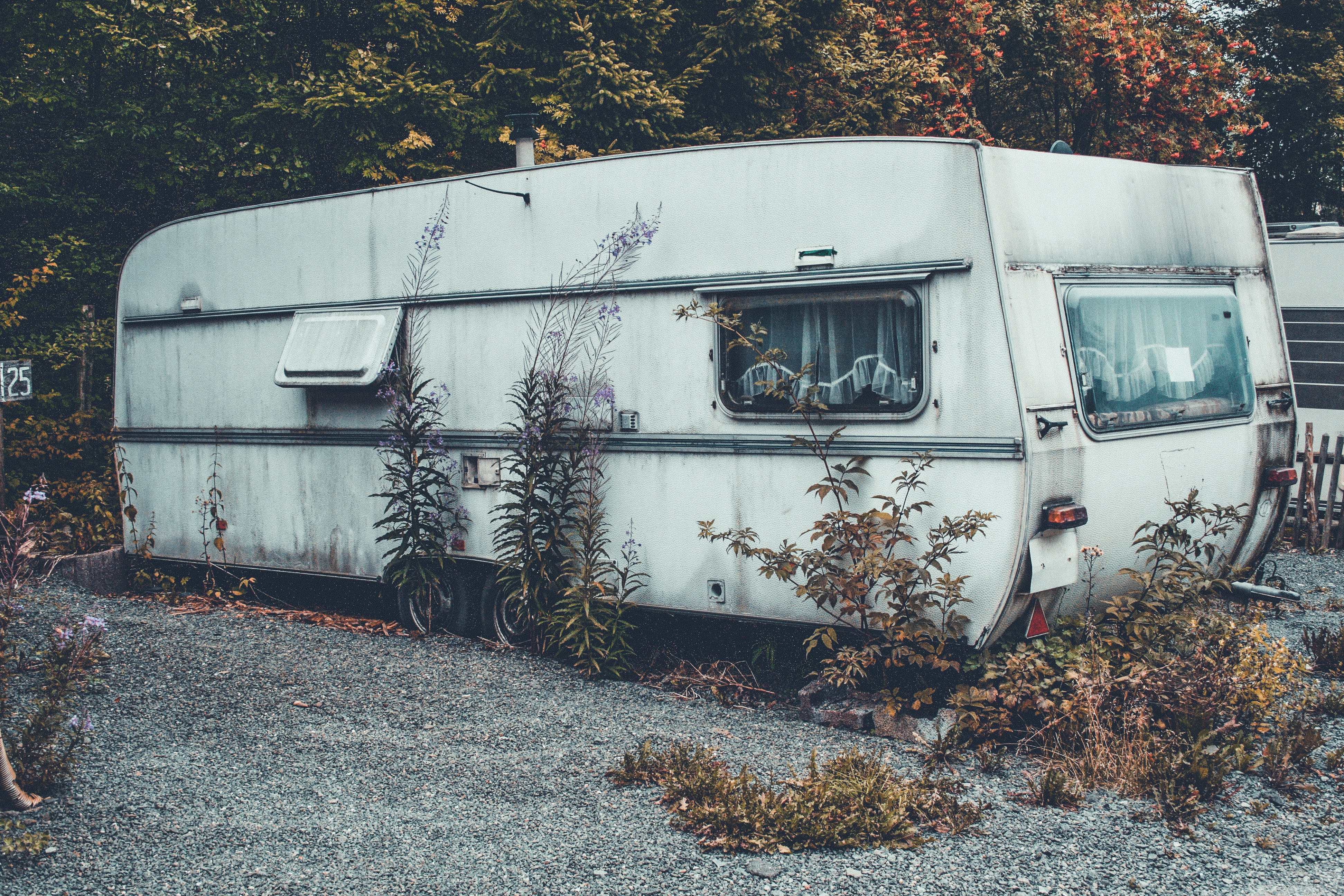 This is a photo of an old, run down caravan.
